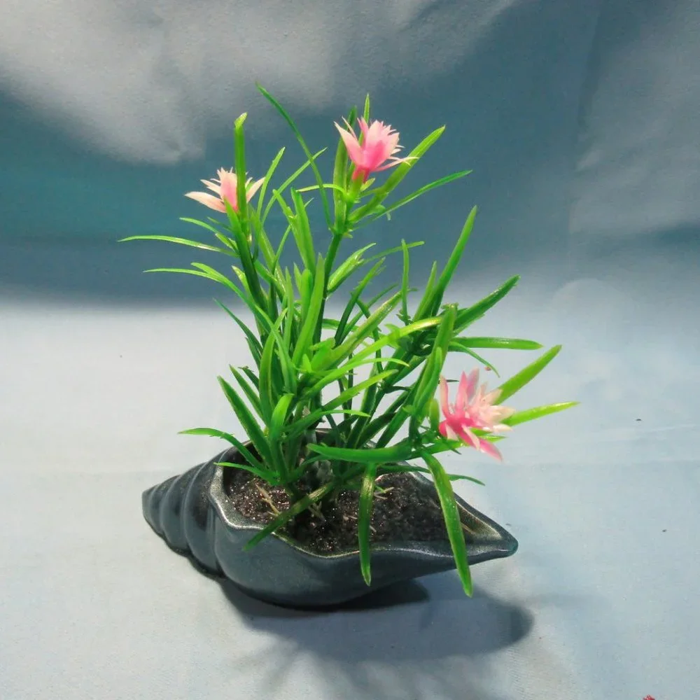 Aquarium Decoration -Teal Blue Long Shell with Flowering Plant.